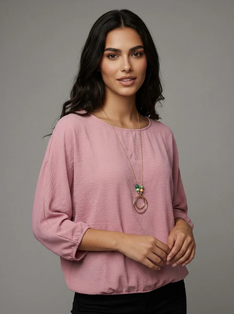 Pink top with necklace