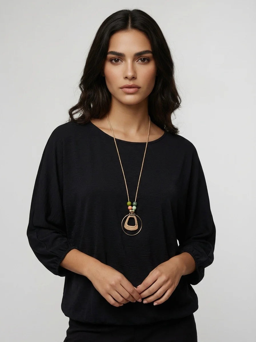 Black top with necklace