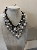 Black faux leather and pearl beaded necklace button fasten